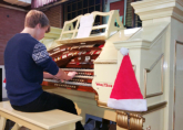 Thomas preparing to play at the ATOS Woking Christmas Concert - Dec 2014